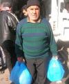 Man carrying food aid