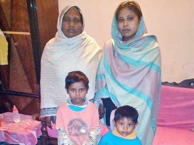 Naila with her mother and children. Naila earns 73p a day but trusts in Jesus Christ to provide