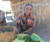 Selling cactus leaves in Androy, Madagascar. In their desperate hunger, people buy and eat them because there is nothing else