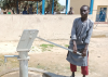 A young Cameroonian Christian refugee draws water from a Barnabas-funded borewell at a refugee camp in Chad