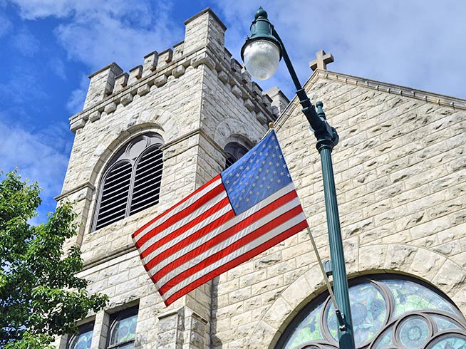 The 'Stars and Stripes' is raised outside Churches and civic buildings in the US