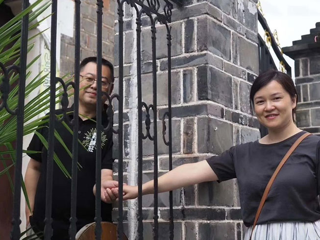 Pastor Wang Yi and his wife, Jiang Rong 